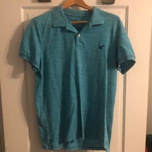 American Eagle two button collar shirt pull over large turquoise eagle on the ft